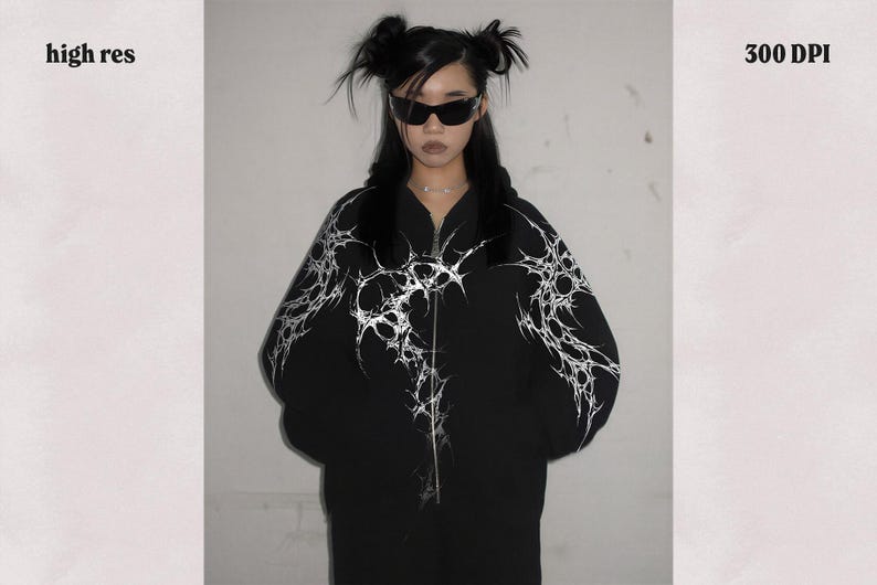 May include: Black zip-up hoodie with a white, abstract design. The hoodie features a high collar and a full-length zipper. The words "high res" and "300 DPI" are visible in the image.