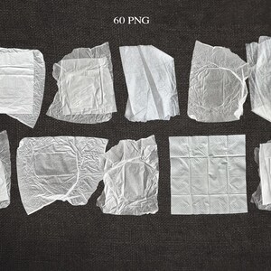 May include: An assortment of ten white, square-shaped paper items, each wrapped in translucent, crinkled paper. The items are arranged on a dark gray textured surface. The text "60 PNG" is visible in the upper left corner.