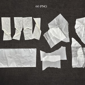 May include: A collection of torn white paper pieces arranged on a dark gray textured surface. The pieces vary in size and shape, with some folded and crumpled. The text "60 PNG" is in the upper center.