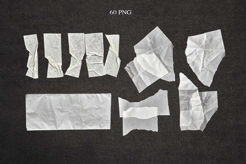 May include: A collection of torn white paper pieces arranged on a dark gray textured surface. The pieces vary in size and shape, with some folded and crumpled. The text "60 PNG" is in the upper center.
