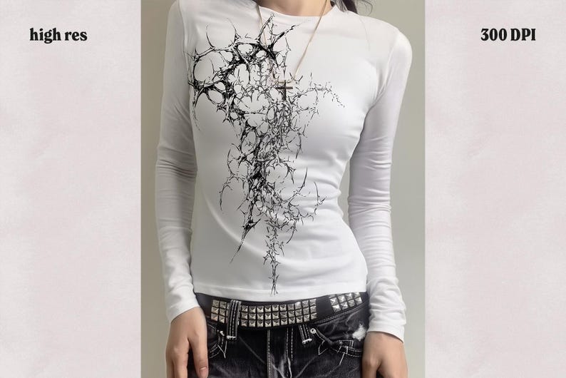May include: White long-sleeve shirt with a black abstract design. The graphic resembles a network of interconnected lines and shapes. The shirt is paired with a studded belt and dark-colored pants. Text on the image reads "high res" and "300 DPI".