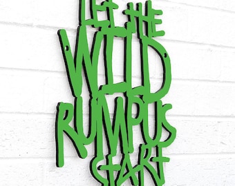 May include: Green wooden sign with the text "Let the Wild Rumpus Start" in a bold, stylized font.
