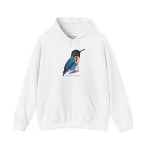 May include: White hooded sweatshirt with a colorful hummingbird illustration and the text "Mellisuga helenae" printed on the front.