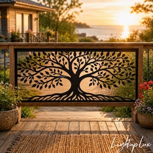 May include: A black metal railing panel featuring a laser-cut design of a tree with sprawling branches and roots. The panel is framed by a wooden structure and positioned on a deck, with the text Lightup lux visible in the lower right corner.