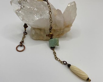 Carved Bone Pendulum