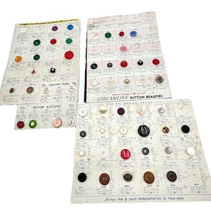 May include: A vintage card with a variety of buttons for sale. The card is divided into sections with different prices and descriptions. The buttons are in various colors, shapes, and sizes. The card reads "Streamline Button Beauties 25c and 29c Retail Items".