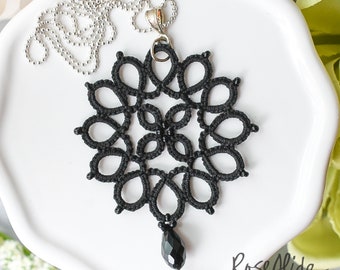 Black beaded lace pendant necklace with faceted teardrop crystal