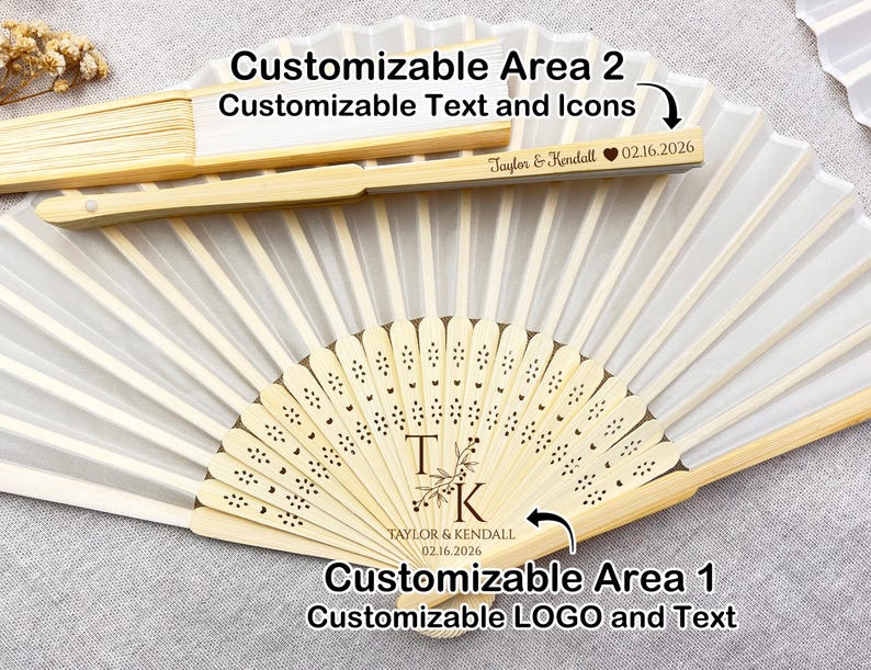 May include: A personalized folding fan with a bamboo frame and white fabric. The fan features customizable text and a logo area, with the text "Taylor & Kendall 02.16.2026" visible. The fan is designed for weddings or special events.