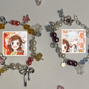 handmade matching bracelets kamisama kiss themed pink/orange and blue/purple