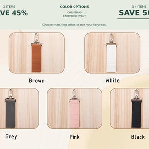 May include: Five rectangular key fob straps with silver-toned metal lobster clasps, displayed in brown, white, grey, pink, and black. The text reads: 2 ITEMS SAVE 45%, COLOR OPTIONS CHRISTMAS EARLY-BIRD EVENT, 3+ ITEMS SAVE 50%, Choose matching colors or mix your favorites.