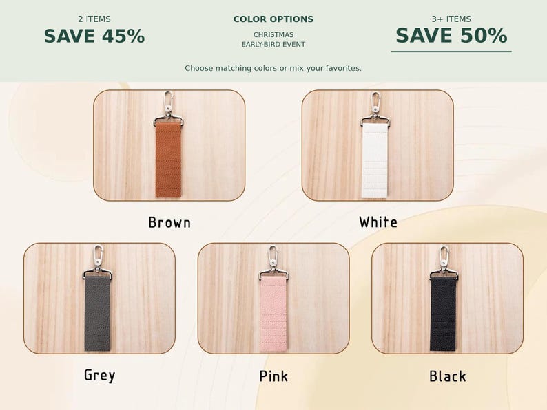 May include: Five rectangular key fob straps with silver-toned metal lobster clasps, displayed in brown, white, grey, pink, and black. The text reads: 2 ITEMS SAVE 45%, COLOR OPTIONS CHRISTMAS EARLY-BIRD EVENT, 3+ ITEMS SAVE 50%, Choose matching colors or mix your favorites.