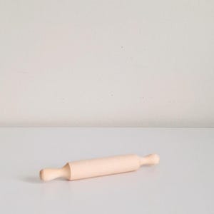 May include: A rustic wooden sign with the text "Welcome to our home" in a handwritten style. The sign is rectangular, with a distressed finish, and features a simple, inviting design. It's suitable for indoor or outdoor use.