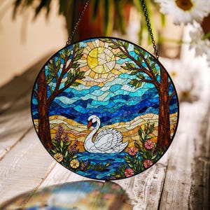 white swan under trees stained glass window suncatcher forest lake art gift for bird lovers