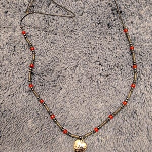 Bead and charm native style necklace