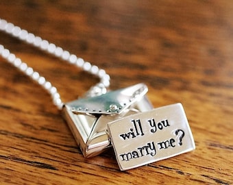 hand stamped, personalized, hidden message in envelope sterling silver necklace