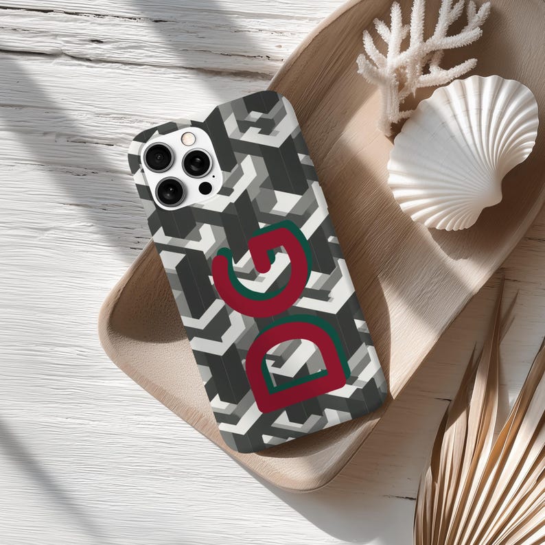 Personalized Monogram Phone Case: iPhone, Samsung & Pixel | Geometric Custom Initials (MagSafe Available)
💎 Your phone is part of your everyday life — make it yours.
This personalized monogram phone case features a bold geometric pattern and customizable initials designed to stand out. Inspired by modern luxury patterns, it brings a designer-style identity to something you carry every day.