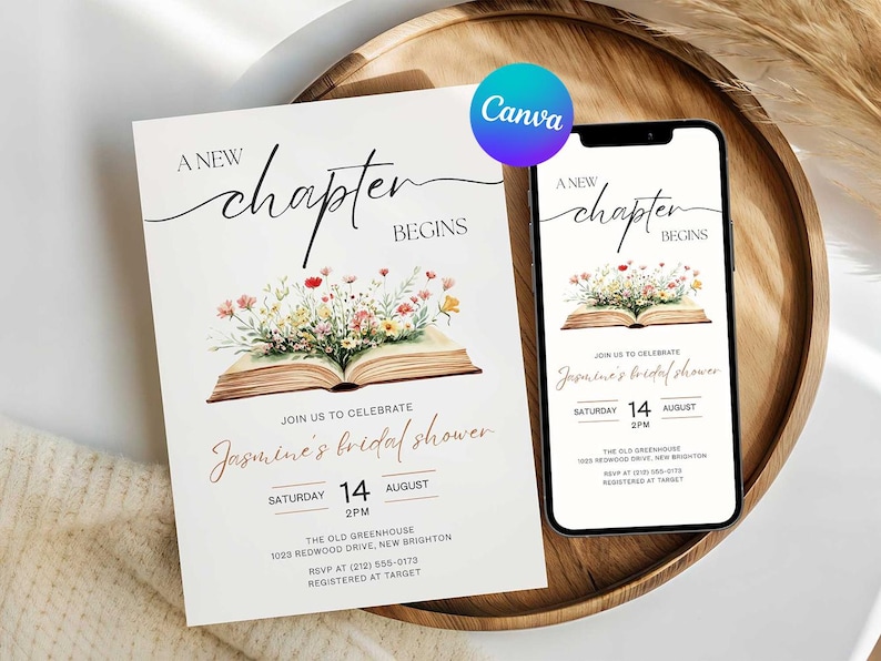 May include: A bridal shower invitation with the text "A New Chapter Begins" and "Jasmine's bridal shower". The design features an open book with floral arrangements. A smartphone displays the same invitation. The invitation is on a wooden tray.