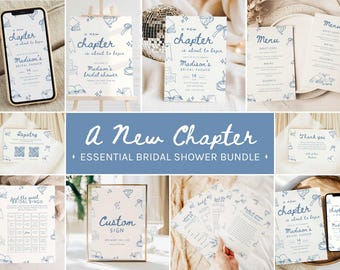 May include: A collection of bridal shower stationery with a blue and white theme. The set includes invitations, menus, a registry card, a bingo game, and a custom sign. The phrase "A New Chapter" is featured prominently.