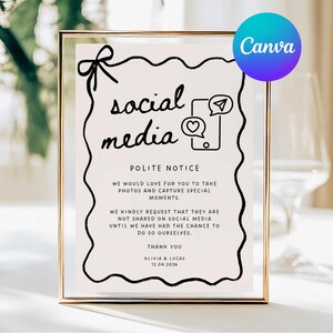 May include: A framed sign with the words "social media" in a whimsical font. The sign includes a polite notice requesting guests not to share photos on social media. The Canva logo is in the upper right corner.