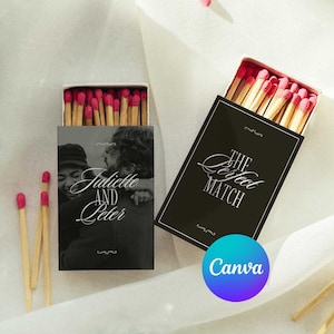 May include: Two rectangular matchboxes filled with wooden matches featuring pink tips. One box displays a black and white photograph of a couple with the text Juliette AND Peter. The other box is black with the white text THE PERFECT MATCH.