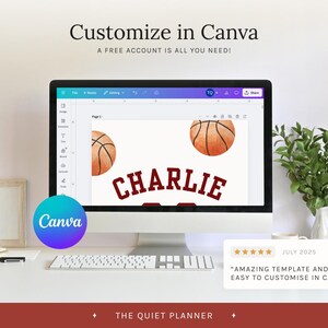 May include: A computer monitor displays a basketball-themed design with the name "Charlie" in maroon. The Canva logo is visible, along with the text "Customize in Canva." A keyboard, notepad, and greenery are on the desk.