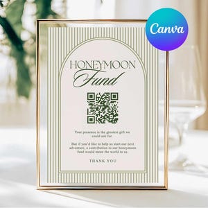 May include: A framed sign with the words "HONEYMOON Fund" in elegant script. The sign includes a QR code and text that reads "Your presence is the greatest gift we could ask for." The sign is in a gold frame.