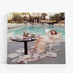 May include: A white ceramic mug with a black handle and the text "But First, Coffee" in a handwritten style. The mug is on a white surface. The mug is 4 inches tall.