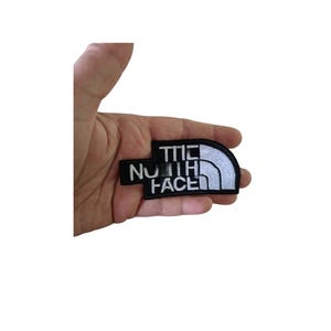 The North Face Embroidered Iron-On Patch: Branded Logo