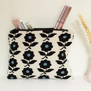 Piccola borsa con fiori neri, borsa per cosmetici, borsa in tessuto, soprammobili, kit di pronto soccorso, borsa con cerniera,