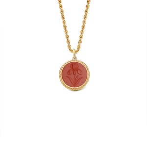 May include: A gold-toned necklace with a rope chain and a round pendant. The pendant features a red-orange iris flower design within a gold border. The necklace is displayed against a white background.