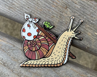 Hobo snail hittin' the road - 1.5 inch hard enamel pin - black nickel - quirky cute gastropod fashion accessory