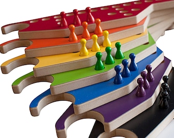 PEGS and Jokers 8-player Game with Interlocking paddles.