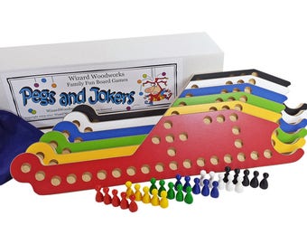 PEGS and Jokers 6-Player Game with Handmade Interlocking paddles.