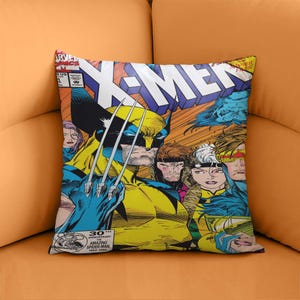 May include: Square throw pillow featuring a comic book cover with the title "X-Men" in large white letters. The image includes Wolverine with his claws extended, and other comic book characters in a colorful design.