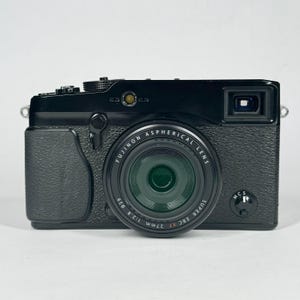 Vintage FUJIFILM X-Pro1 mirrorless digital rangefinder camera w/ XF 27mm f/2.8 lens