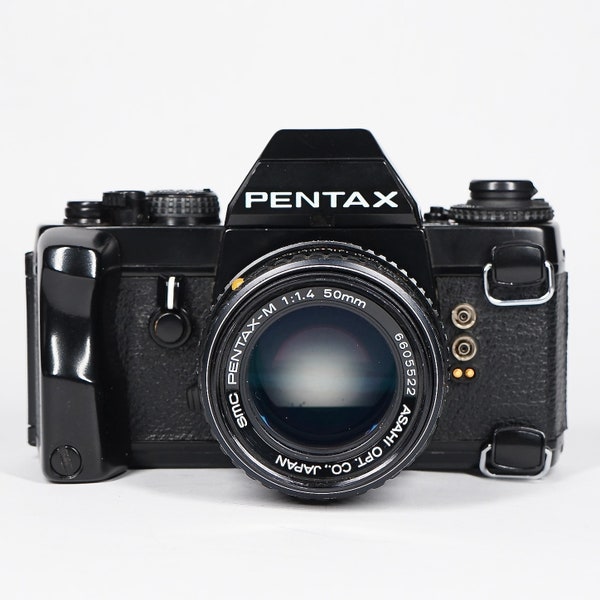 Vintage PENTAX LX 35mm film SLR camera w/ smc Pentax-M f/1.4 50mm prime lens