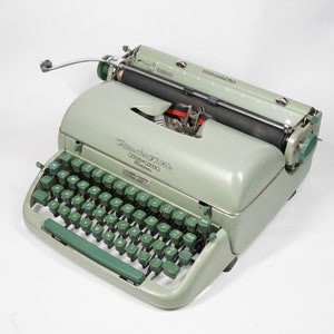 Vintage 1960's REMINGTON Quiet-Riter Eleven Portable Mechanical Typewriter