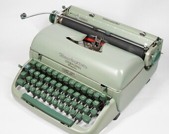 Vintage 1960's REMINGTON Quiet-Riter Eleven Portable Mechanical Typewriter