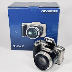 Vintage Olympus SP-800UZ Y2k Point-and-shoot digital camera 14-megapixel CCD