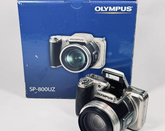 Vintage Olympus SP-800UZ Y2k Point-and-shoot digital camera 14-megapixel CCD