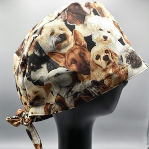Calling all dog lovers! Large, tie-back scrub cap featuring realistic dogs. Perfect for all medical professionals.