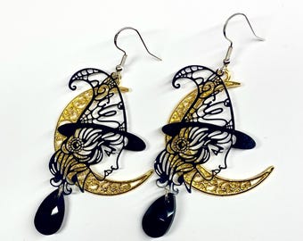 Pendientes de bruja con luna creciente: joyas góticas con un toque dorado y negro