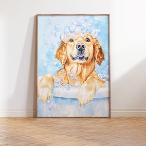 May include: A framed watercolor print of a Golden Retriever dog in a bathtub, covered in bubbles. The dog has a happy expression, with its paws resting on the tub's edge. The background is a light blue with more bubbles.
