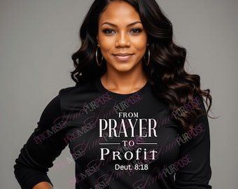 May include: A black long-sleeved shirt with the text "From Prayer to Profit" and the scripture reference "Deut. 8:18" printed in white.