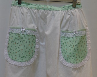WOMEN'S  HALF APRON:White with  a mint green floral print, bias tape and  white lace trim.two pockets