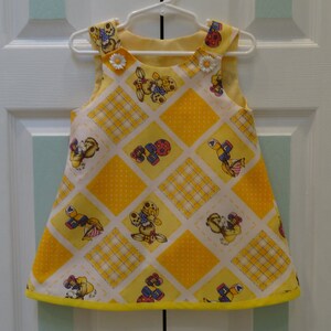 Baby Yellow Dress: Toy Print Sleeveless Outfit, 6-12 Months