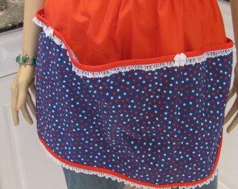 Sale item, WOMEN'S HALF APRON-Patriotic   modern style, in red white and blue print with three large pockets,white lace trim