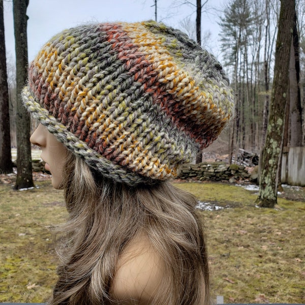 This Knit Hat Is a Comfortable Adult Sized Unisex Beanie With A Slouch Fit, This Is A Warm Hat Knit With Lions Brand Self Striping Yarn