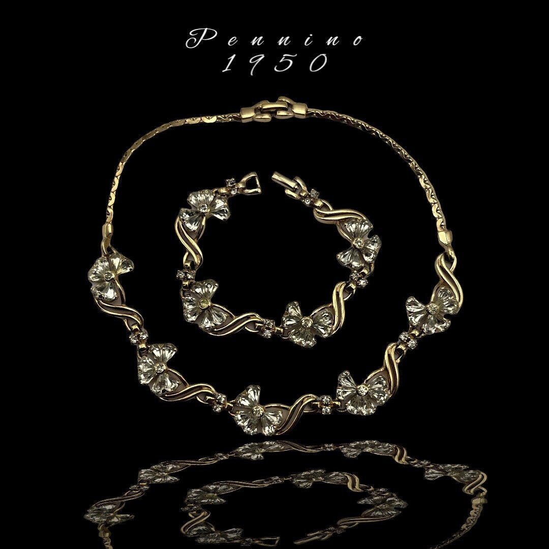 PENNINO Hollywood Glamour Clear Rhinestones flowers set in Gold plated setting Necklace & Bracelet set- art.455/6