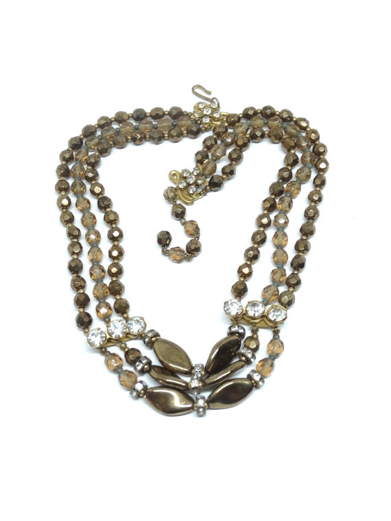 Three strands glass beads Bronze/Brown/Maroon col